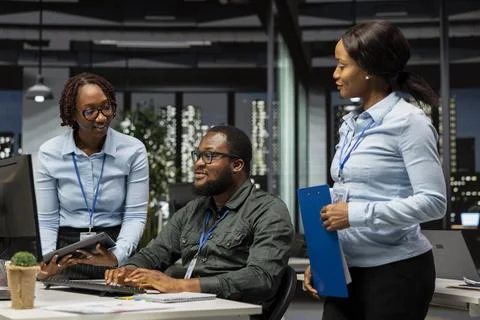 African american analysts collaborating on a project with financial forecasting Stock Photos