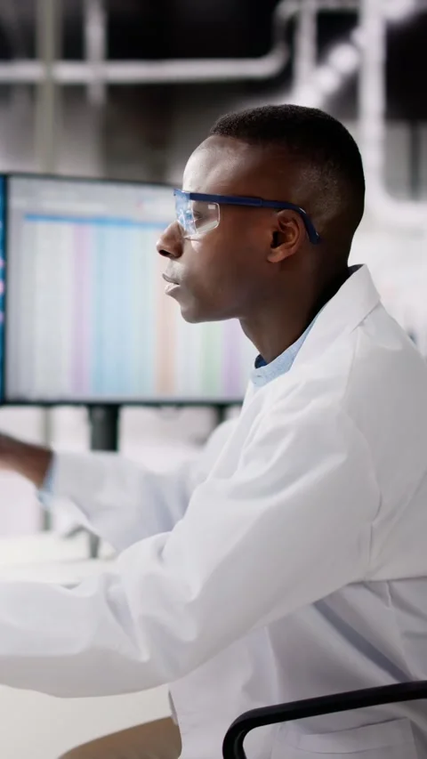 African American Analyzing Spreadsheet Data Stock Footage 274377755