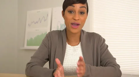 African American business woman talking directly to camera Stock Footage