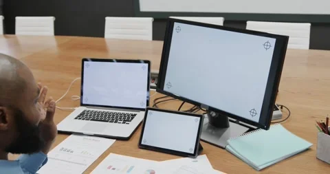 African american businessman using computer, tablet and laptop, copy space on Video stock 335866289