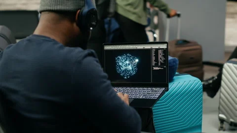 African american casual man using AI neural networks in airport lounge Stock Footage 339644200