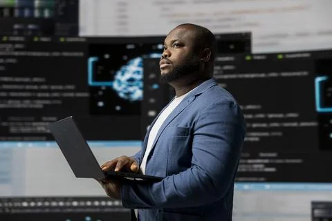 African american coder expert immersing in software development 写真素材