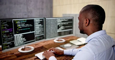 African American Coder Using Computer At Desk Stock Footage 230066096