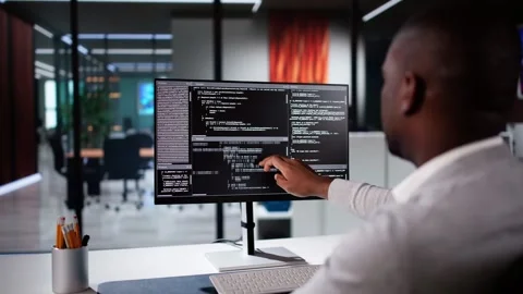 African American Coder Using Computer At Desk Stock Footage 293135351