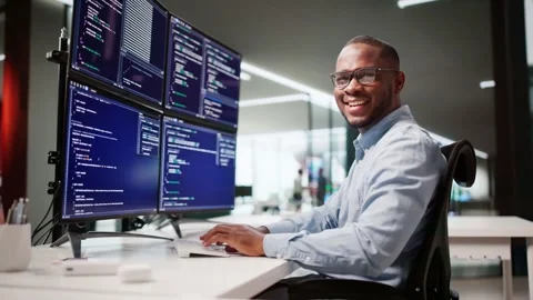 African American Coder Using Computer At Desk Stock Footage 320767615