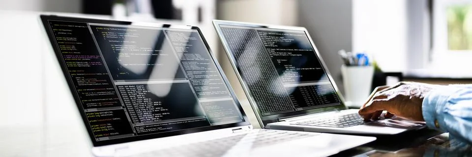 African American Coder Using Computer At Desk Foto stock