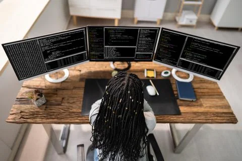 African American Coder Using Computer At Desk 스톡 사진