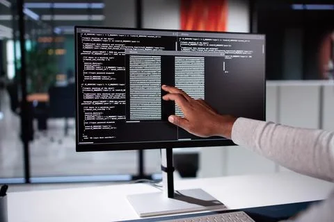 African American Coder Using Computer At Desk Stock Photos