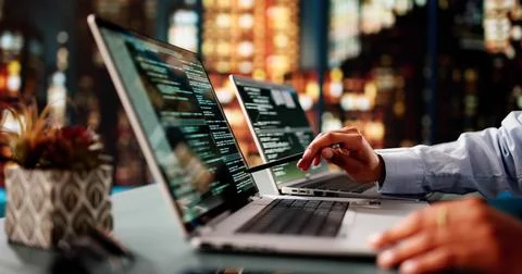 African American Coder Using Computer At Desk Stock Photos