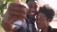 African American Couple Taking A Cell Phone Picture Together Stock Footage