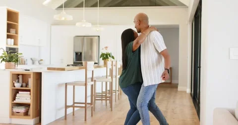 African American couple tapping head making her laugh, dancing solo footwork and Stock Footage 342800367