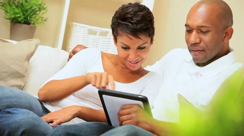 African-American Couple Using Wireless Tablet Stock Footage 3001716