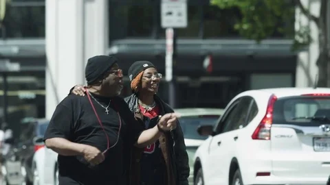 African American Couple Walking Down Street Vídeo Stock 79903005