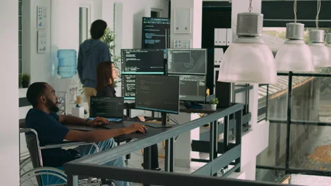 African american developer with impairment using computer to write code 動画素材 227617579