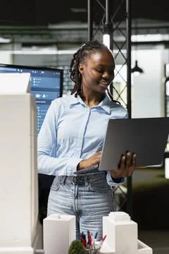 African american developer using modern design software to create a vision Stock Photos