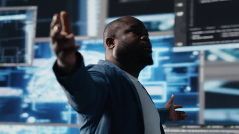 African American developer working in a cyber environment Stock Footage 312300568