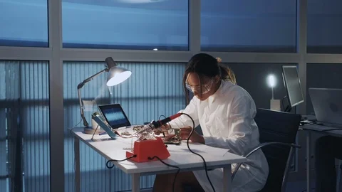 African american electronics specialist working with multimeter tester and other Stock Footage 112865472