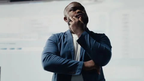 African American engineer analyzing programming language for automation Stock Footage 312359530