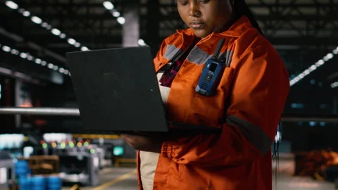 African american engineer, checking factory floor, heavy equipment Stock Footage 330377261