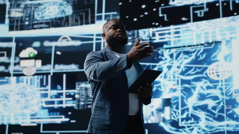 African american engineer examining artificial intelligence brain systems Stock Footage 312305762