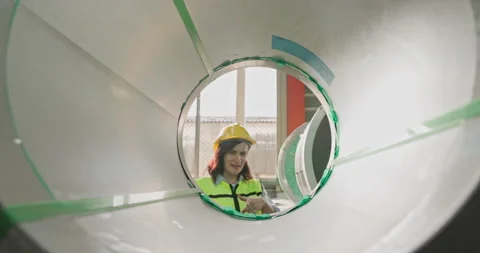 African American engineer man discussing women worker in construction warehouse  Stock Footage 286711341