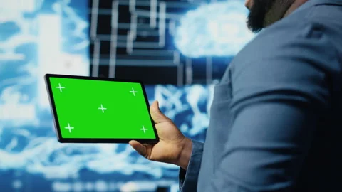 African american engineer shows tablet with isolated mockup display Stock Footage 312476951