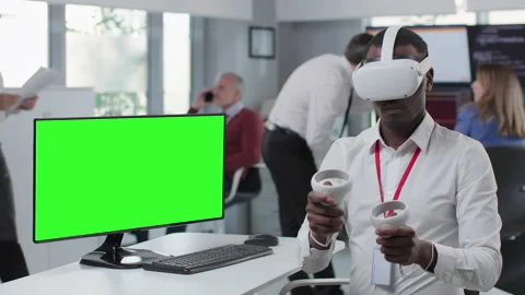 African-American engineer test vr headset and joysticks in modern hi-tech Stock Footage 205833204