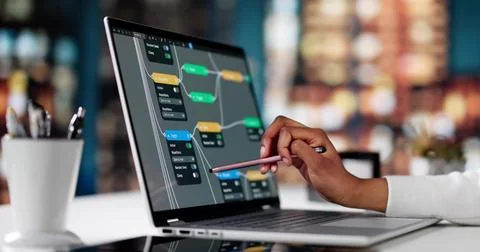 African American Engineer Utilizing Node Editor For AI Business Research. Stock Photos