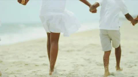 African American family laughing and have fun on beach Stock Footage