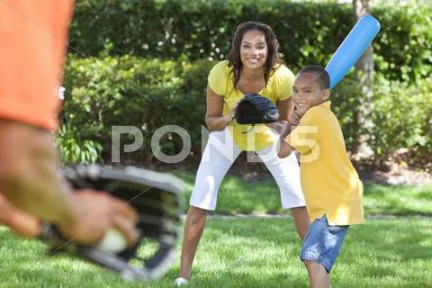 African american family playing baseball Stock Photos