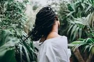 African-American Female In A Leafy Tropical Jungle Stock Photos