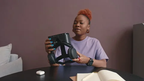 African American Female Software Developer Demonstrating VR Headset Stock Footage 241269711
