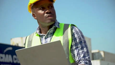 African american Foreman using laptop computer checking inventory control l.. Stock Footage 241717084