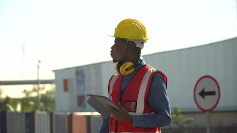 African american Foreman using tablet computer checking inventory control l.. Stock Footage 242309181