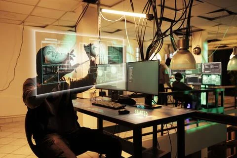 African american hacker breaching database with holograms Fotos de archivo