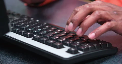 African American hands typing on keyboard 4k Stock Footage
