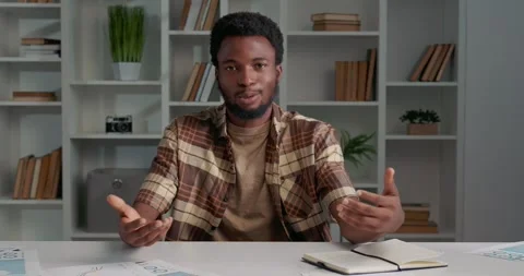African American having interview, talking about himself, looking at camera. Stock Footage 253825569