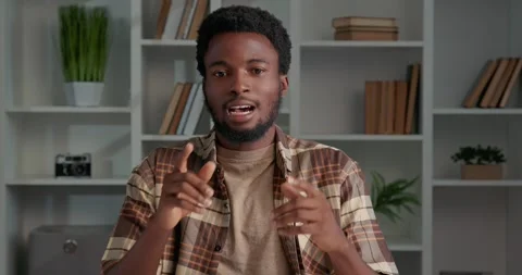 African American having interview, talking about himself, looking at camera. Stock Footage 253825586