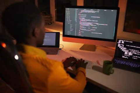African-American IT Developer Writing Code 스톡 사진