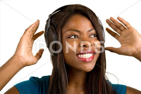 African american lady listening to music with headphones Stock Photos