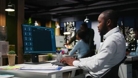 African american male checking web AI chatbot responses for some tasks Stock Footage 318563541