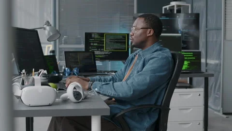 African American Male Software Developer Coding in Office Stock Footage 276203331