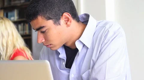 African American Male Student Studying in the Library Stock Footage