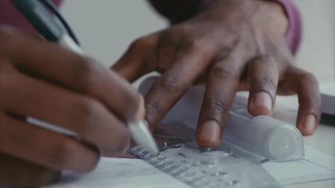 African american man architect drawing on paper while working at office desk. 库存影片 336564569