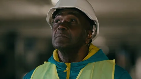 African american man builder inspector architect developer in protect helmet Stock Footage 244739559