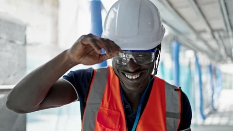 African american man builder smiling confident standing at construction place Stock Footage 250418932