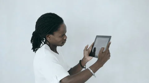 African american man dancing with tablet computer Stock Footage 199630018