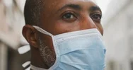 African American Man On The Go Wearing Coronavirus Covid19 Mask Stock Footage