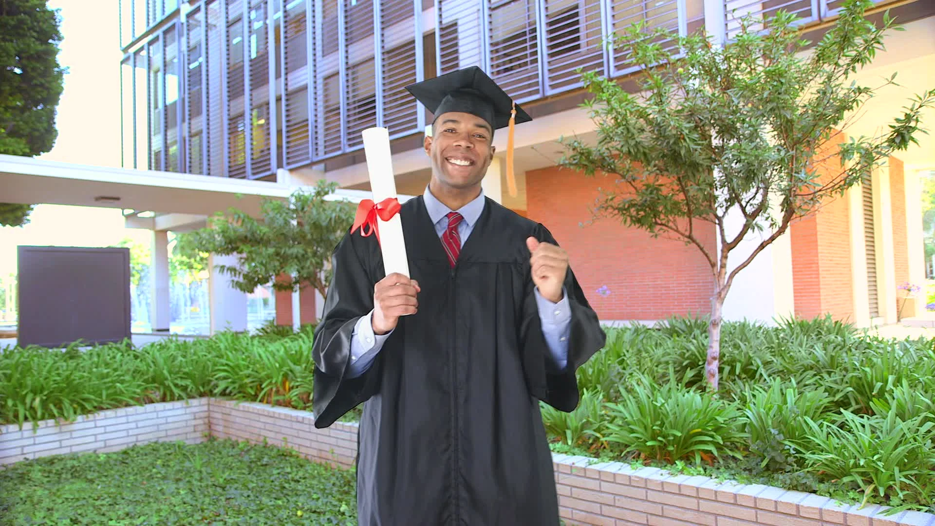 African American man with graduation gow... | Stock Video | Pond5