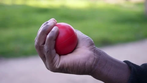 African American man hands using rehab ball side view recovery training Stock Footage 332420667